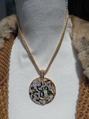 Gold-Tone Filigree Pendant Necklace with Green Accents